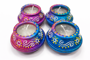 festive earthen matki diyas with wax – set of 4