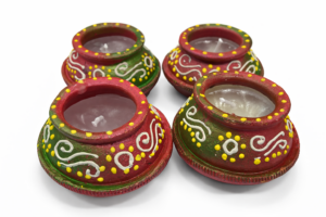 festive earthen matki diyas with wax – set of 4